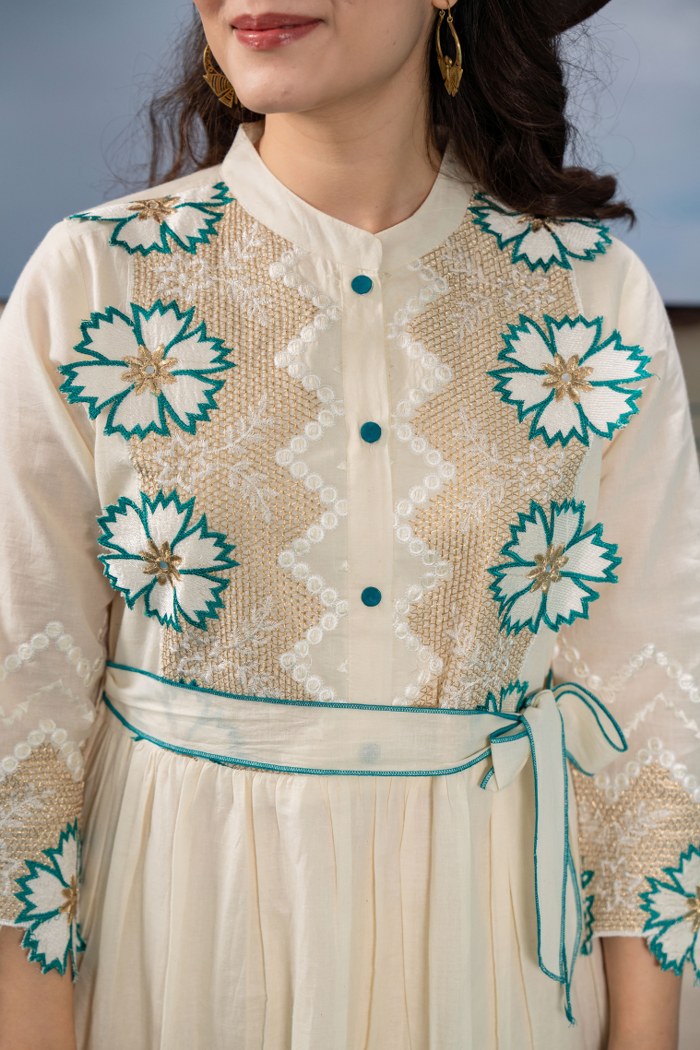 Serene Beauty: Off-White Embroidered Frock