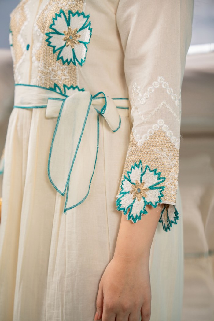 Serene Beauty: Off-White Embroidered Frock