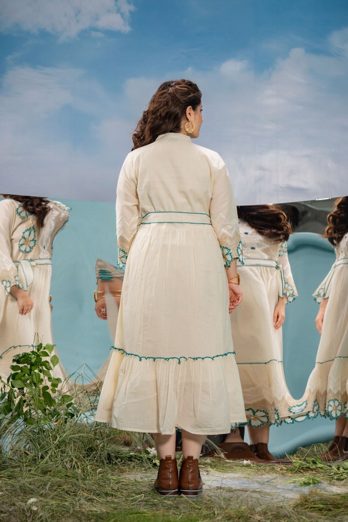 Serene Beauty: Off-White Embroidered Frock