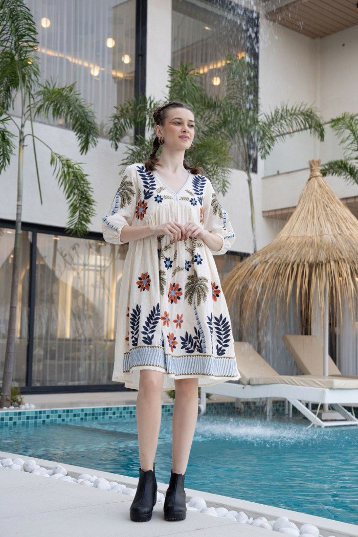 Summer Bloom: Vibrantly Embroidered Off White Dress