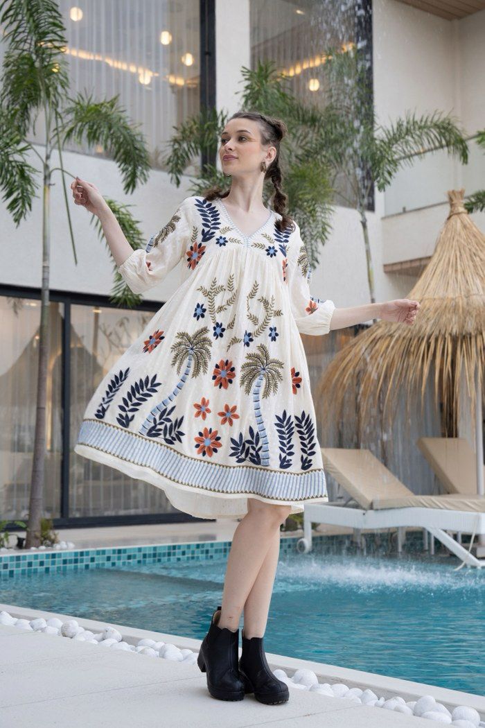 Summer Bloom: Vibrantly Embroidered Off White Dress