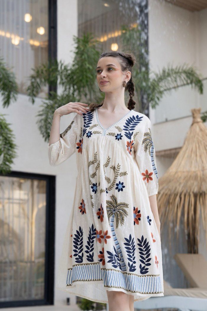 Summer Bloom: Vibrantly Embroidered Off White Dress