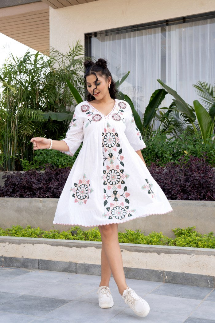 Blossom Grace: White Summer Dress with Vibrant Embroidery