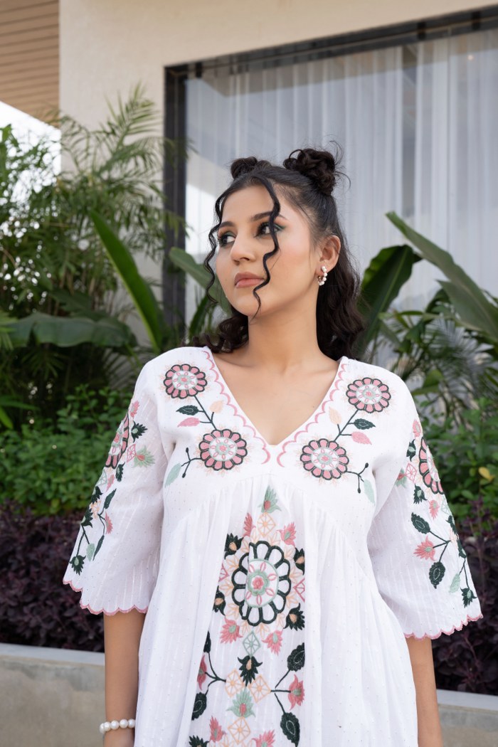 Blossom Grace: White Summer Dress with Vibrant Embroidery