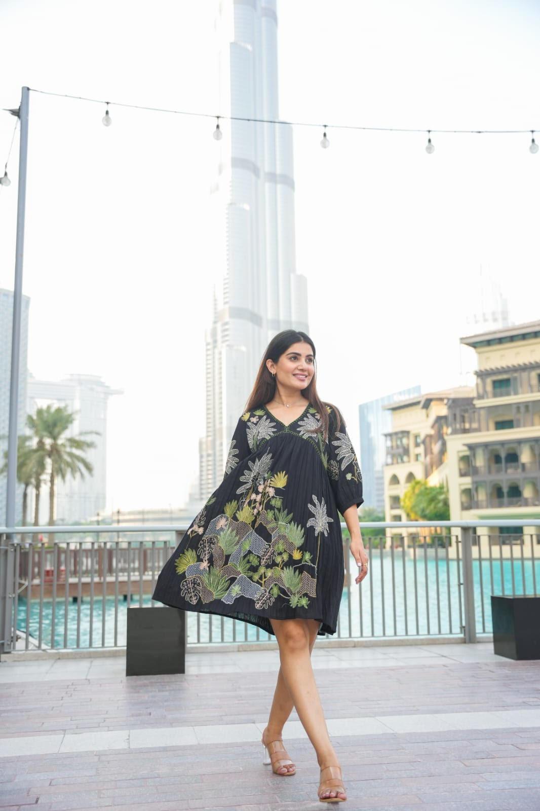 Floral Whispers: Black Dress with Delicate Blooms निवारा (NIVARA)